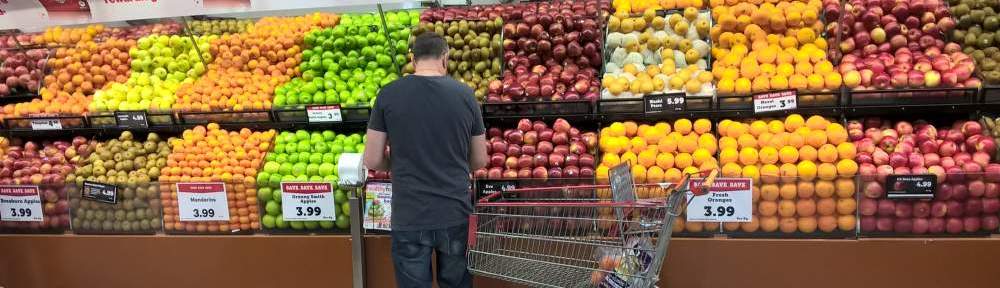 Man selecting fruit
